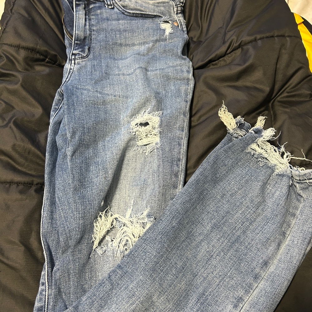 Distressed Blue Jeans